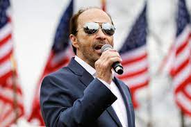 How Many Traveling Bands Are There to Support Lee Greenwood on His Tours?